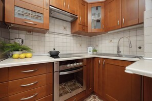 The ergonomic kitchen layout makes cooking your favorite dishes effortless.
