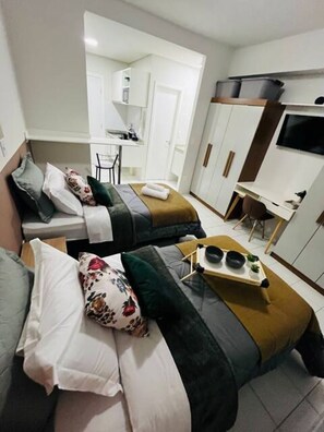 1 dormitorio, tabla de planchar con plancha, wifi gratis y ropa de cama
