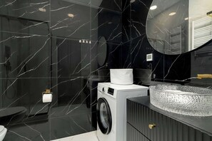 Shower, hair dryer, towels