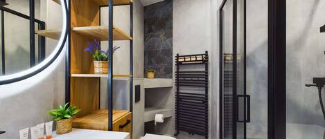 Shower, hair dryer, towels, shampoo