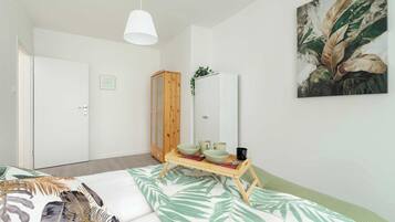 2 dormitorios, tabla de planchar con plancha, wifi y ropa de cama