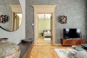 1 bedroom, desk, iron/ironing board, travel crib