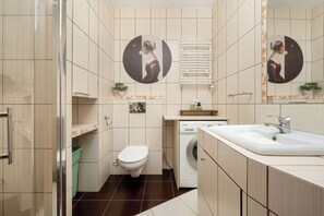 Shower, hair dryer, towels, shampoo