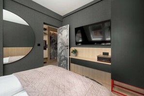 1 bedroom, desk, iron/ironing board, travel crib