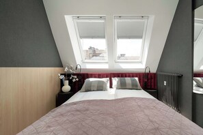 1 bedroom, desk, iron/ironing board, travel crib