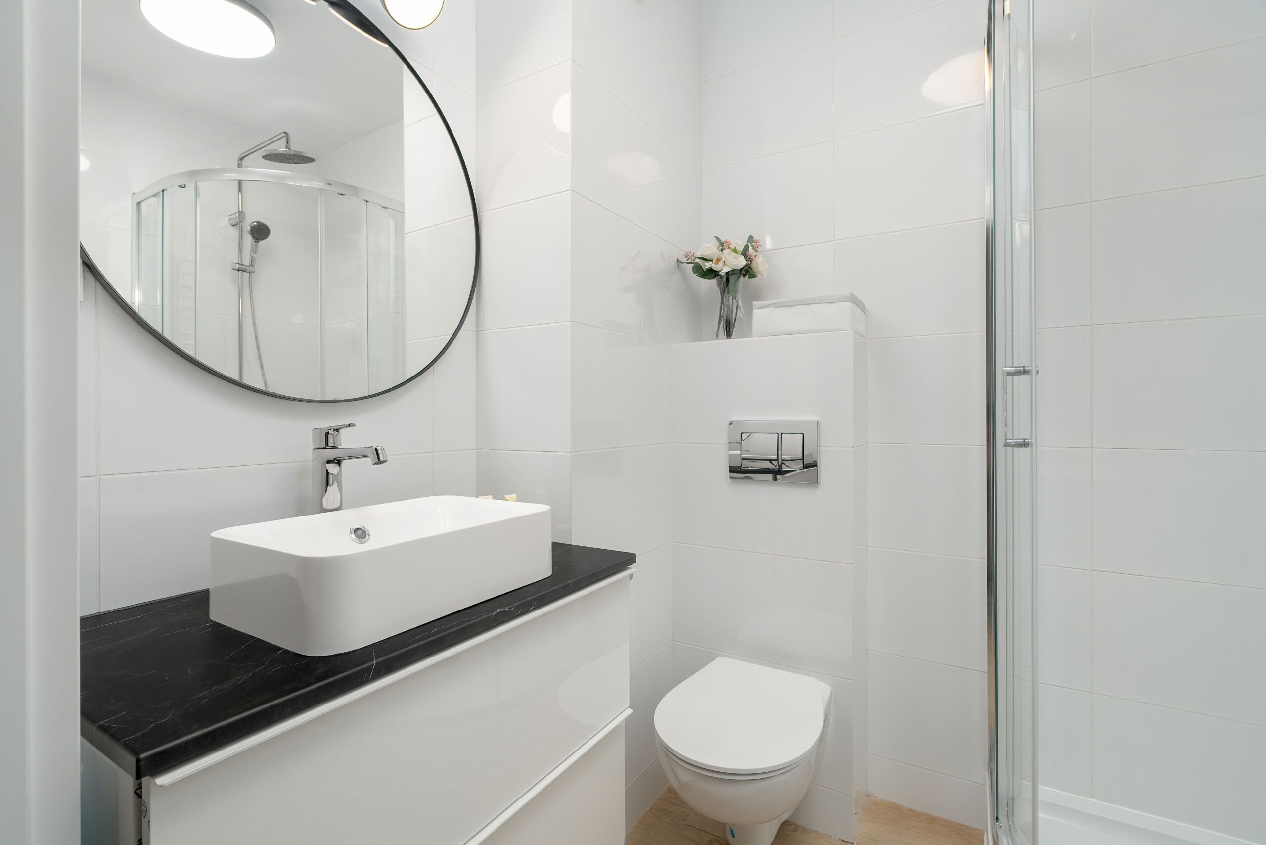 Shower, hair dryer, towels, shampoo
