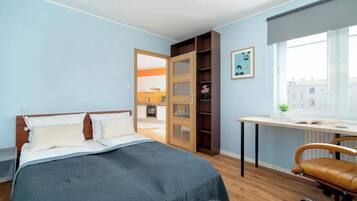 1 bedroom, desk, iron/ironing board, travel crib