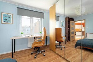1 bedroom, desk, iron/ironing board, travel crib