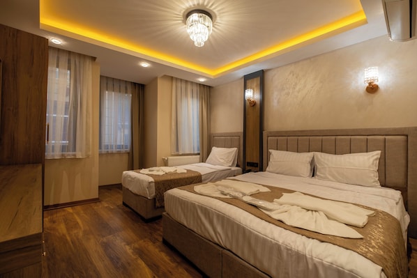 Premium bedding, down comforters, Select Comfort beds, minibar