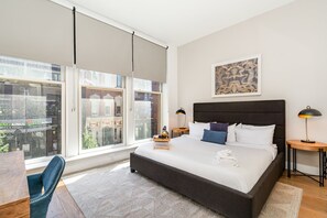 Casa (2 Bedrooms) | Área de sala de estar | Smart TV de 32 pulgadas con canales digitales, Netflix y Hulu