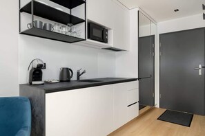 Fridge, microwave, stovetop, coffee/tea maker