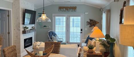 Smart TV, fireplace, books