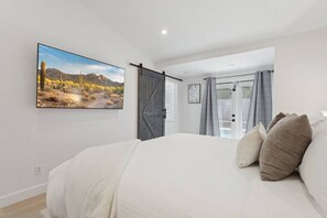 4 bedrooms, iron/ironing board, travel cot, WiFi