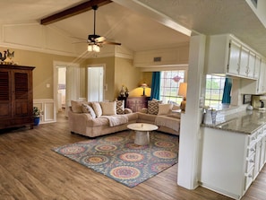Smart TV, fireplace, books, stereo