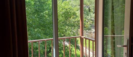 Quadruple Room, Balcony, Garden View | Terrace/patio