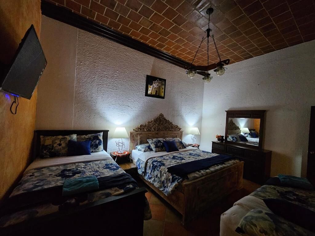 Sengetøy av topp kvalitet, dundyner og individuelt dekorert