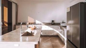 Fridge, microwave, stovetop, coffee/tea maker