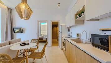 Microwave, coffee/tea maker, electric kettle, dining tables