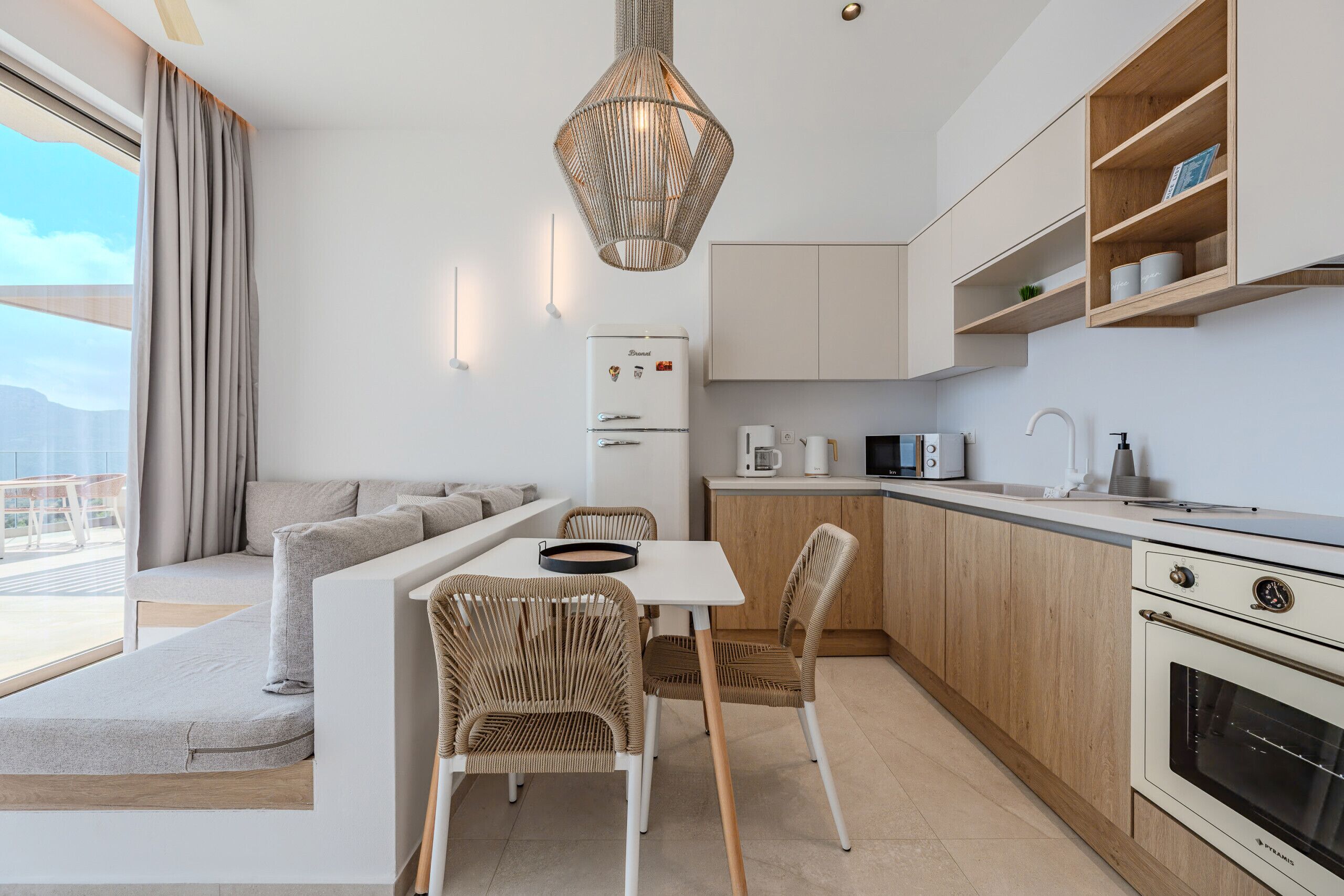 Microwave, coffee/tea maker, electric kettle, dining tables