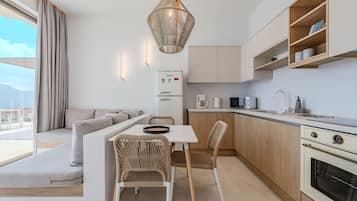 Microwave, coffee/tea maker, electric kettle, dining tables