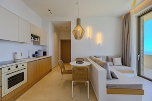 Microwave, coffee/tea maker, electric kettle, dining tables