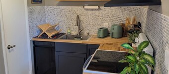 Updated boho inspired 2-bedroom beach side townhome in beautiful Cape Canaveral.