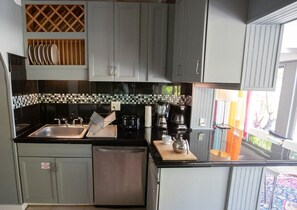 Oven, stovetop, coffee/tea maker, cookware/dishes/utensils
