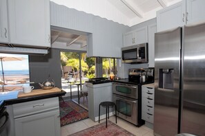 Oven, stovetop, coffee/tea maker, cookware/dishes/utensils