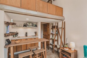 Microwave, coffee/tea maker, toaster, cookware/dishes/utensils