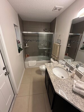 Hair dryer, towels, soap, toilet paper