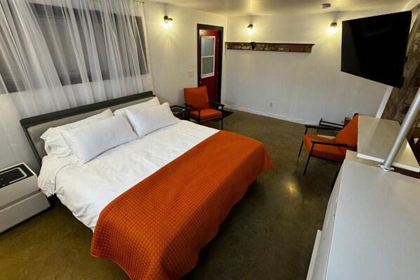 Suite monolocale Comfort, letti multipli, non fumatori, angolo cottura | Una cassaforte in camera, tende oscuranti, Wi-Fi gratuito