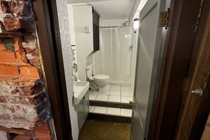 Comfort Studio Suite, Multiple Beds, Non Smoking, Kitchenette | Bathroom | Hair dryer, slippers, towels, soap - Main Street Hotel (Nanton)