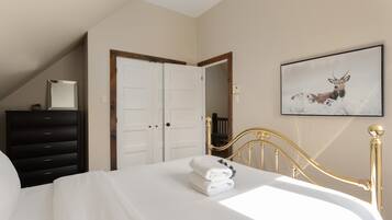 Bedroom three on the upper also offers a queen (yes, that's three queens upstairs). We also offer a pack and play for the littlest guests.