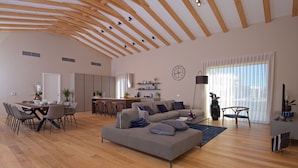 A spacious living area with a wooden ceiling, a sofa, a dining table with chairs, a kitchen area, and a large window with curtains. - Luxury villa with pool and panoramic views - the perfect vacation in the heart of Istria (Brtonigla)