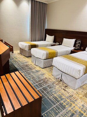 Standard Triple Room, City View | In-room safe, iron/ironing board, free WiFi, bed sheets