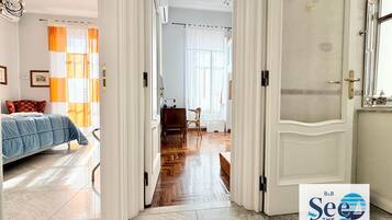 Chambre Quadruple Luxe, balcon, vue mer | Bureau, espace de travail pour ordinateur portable, Wi-Fi gratuit