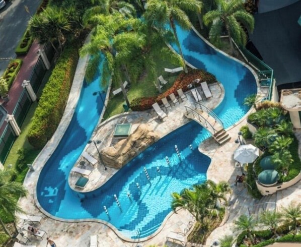 Outdoor pool, open 8:00 AM to 6:00 PM, pool umbrellas, pool loungers