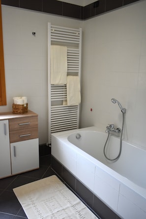 Hair dryer, bidet, towels, toilet paper