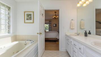 Jetted tub, hair dryer, towels, soap