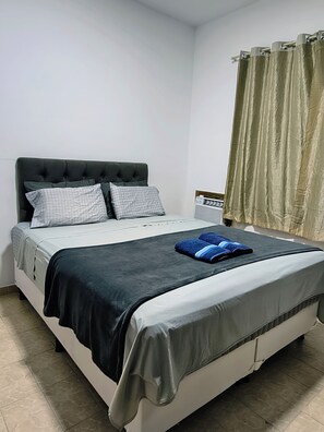 4 dormitorios, tabla de planchar con plancha, wifi y ropa de cama