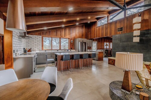 Mid-Century Haven with Private Lakes and Endless Views