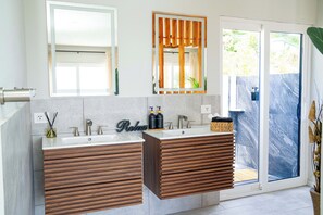 Shower, hair dryer, towels, soap