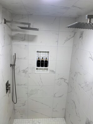 Shower, eco-friendly toiletries, hair dryer, towels