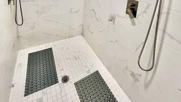 Shower, eco-friendly toiletries, hair dryer, towels