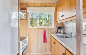 Fridge, stovetop, coffee/tea maker
