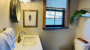 Shower, towels, soap, toilet paper