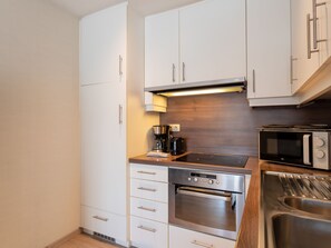 Fridge, microwave, oven, cookware/dishes/utensils