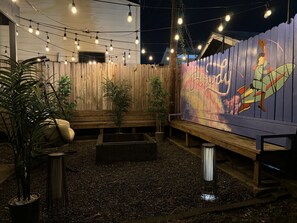 Terrace/patio - Nebula Ranch · Fire Pit · King Bed · Mural Yard · Houston Heights (Houston)