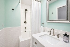 Hair dryer, towels, soap, shampoo