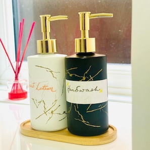 Shower, hair dryer, towels, soap